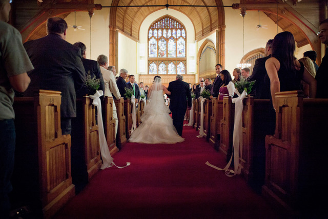 The sanctuary's red-carpeted aisle leading to the chancel